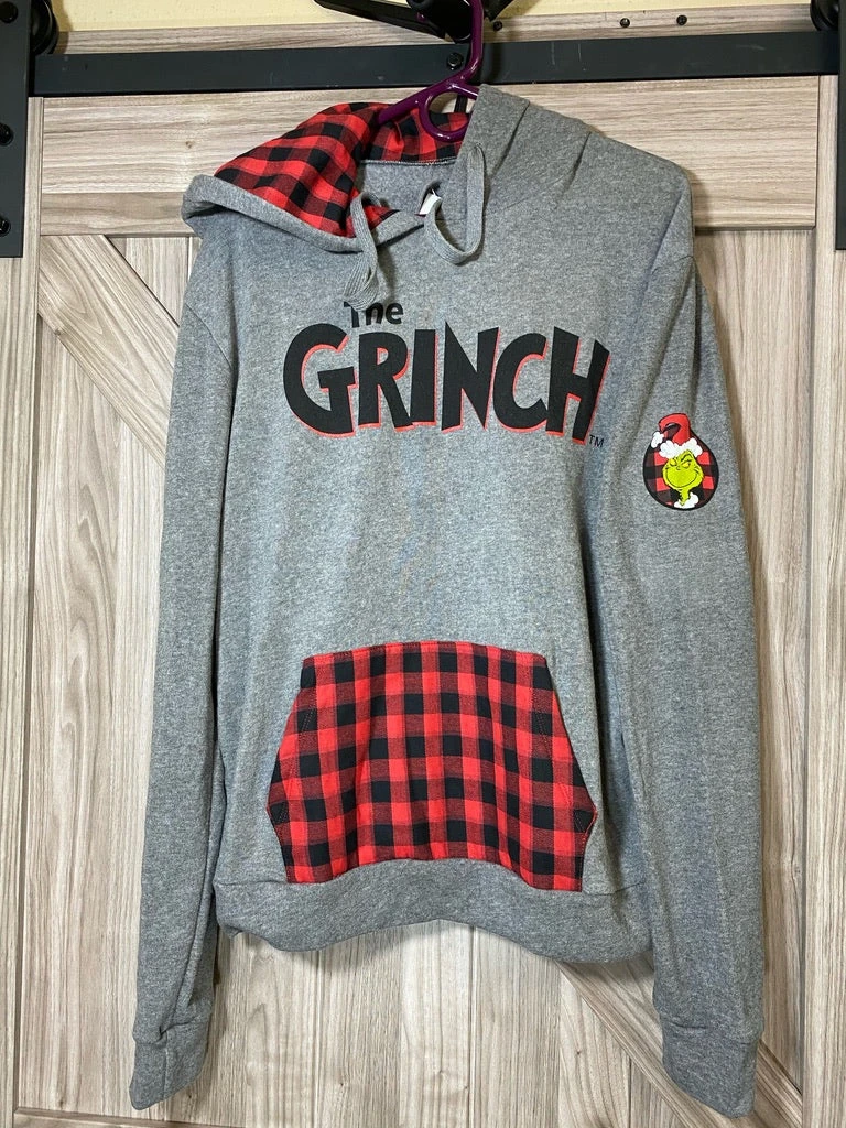 Universal Studios Dr. Seuss The Grinch Buffalo Plaid Hoodie 1 Universal Studios Dr. Seuss The Grinch Buffalo Plaid Hoodie